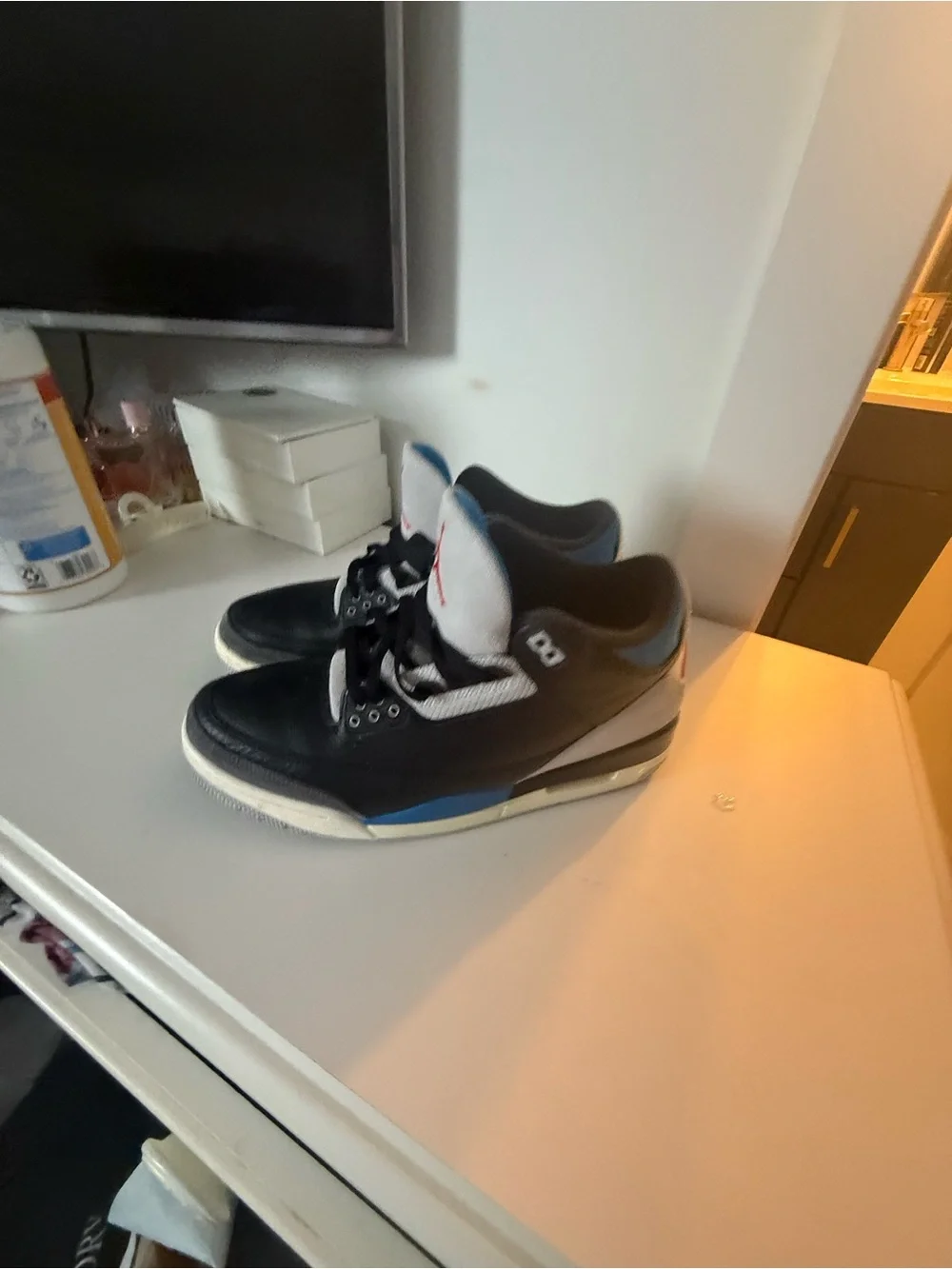 Jordan Retro Black and White Men’s Sneakers with Blue Accent